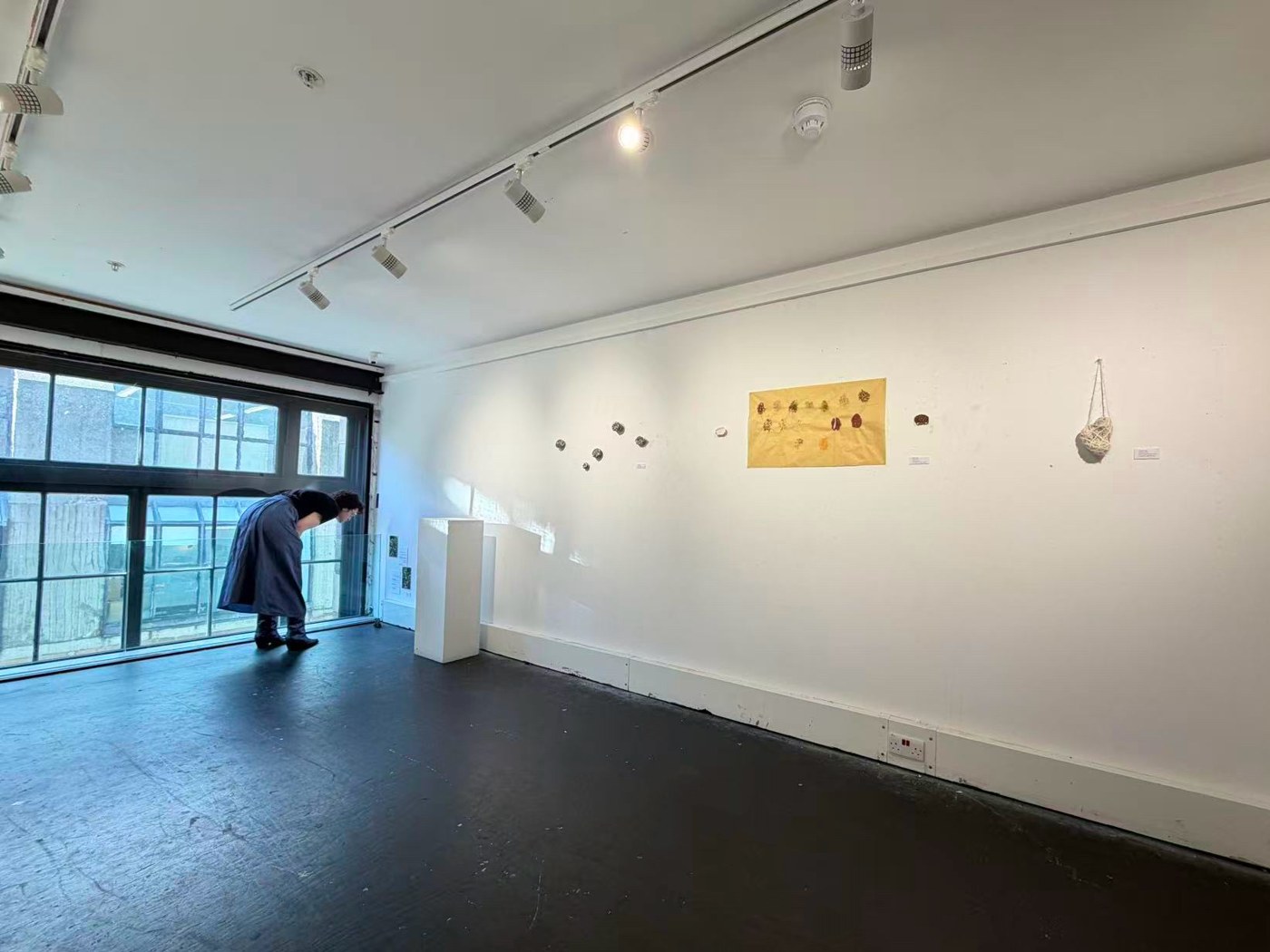 Visitor engaging with the exhibition, 2026.
