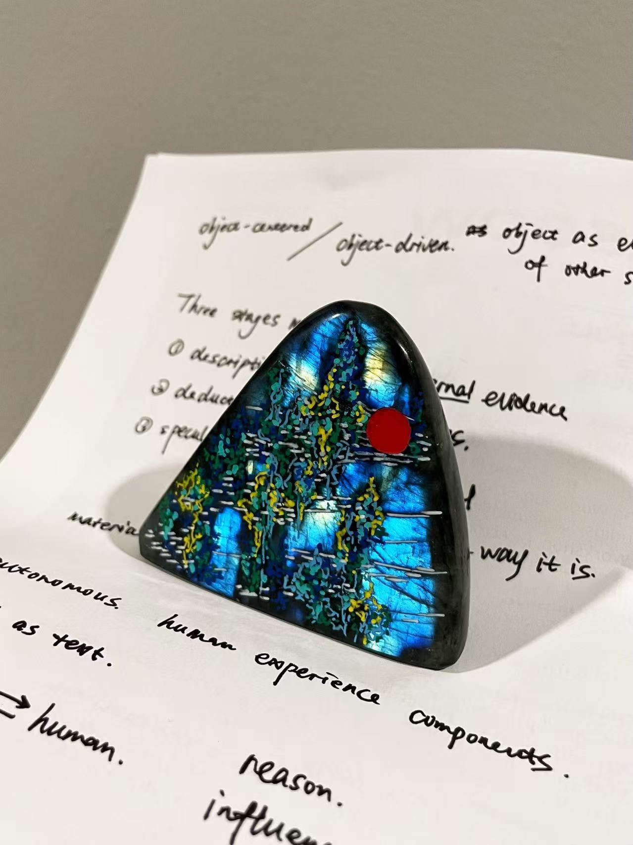 Painted labradorite with handwritten text, 2025